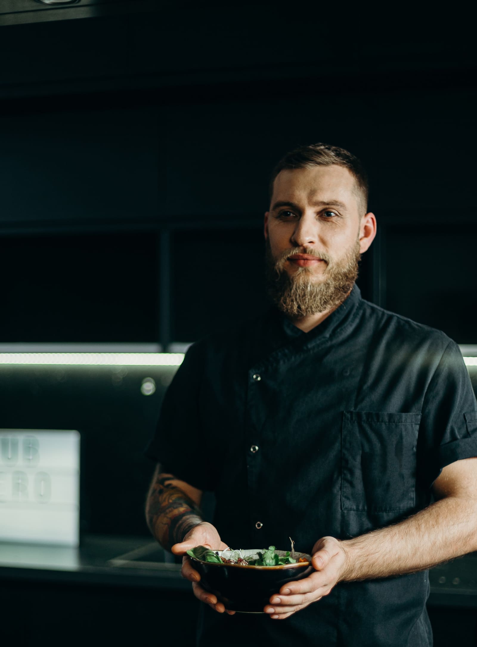 Chef holding bowl info92x